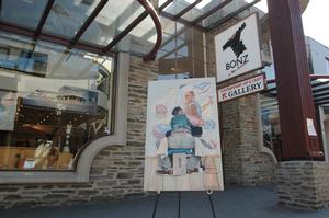 Graham Henry &#8211; Tattoo by Thomas Brown, pictured in front of the BONZ Gallery Queenstown Mall